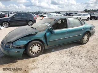 1997 Ford Taurus LX with VIN 1FALP53S1VG316689, listed as a Copart auction lot 67168694 with 211,414 mi miles and Salvage Title. Bid and sale history available at carsss.com. Image 1.