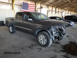 2022 Nissan Frontier SV with VIN 1N6ED1EJ4NN618009, listed as a Copart auction lot 61503845 with 61,743 mi miles and Salvage title. Bid and sale history available at DreamBid. Image 4.