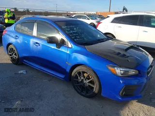 2021 Subaru WRX Limited with VIN JF1VA1H66M9810273, listed as a IAAI auction lot 41223604 with 52,836 mi miles. Bid and sale history available at carsss.com. Image 1.