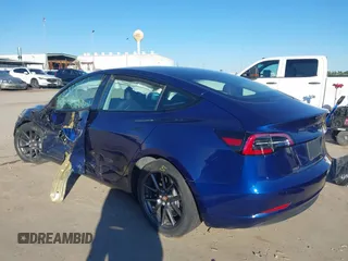 2023 Tesla Model 3 with VIN 5YJ3E1EA6PF505252, listed as a IAAI auction lot 41380172 with 31,141 mi miles and . Bid and sale history available at DreamBid. Image 3.