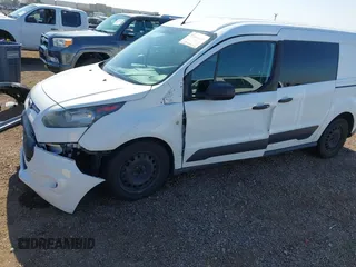2015 Ford Transit Connect XLT with VIN NM0LS7F72F1202777, listed as a IAAI auction lot 42004476 with 120,661 mi miles and . Bid and sale history available at DreamBid. Image 6.