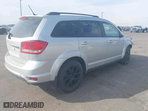 2013 Dodge Journey SXT with VIN 3C4PDDBG9DT680798, listed as a IAAI auction lot 41655958 with 140,594 mi miles and . Bid and sale history available at DreamBid. Image 4.