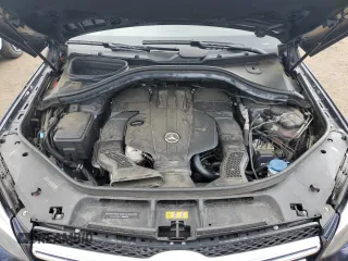 2019 Mercedes-Benz GLE 400 with VIN 4JGDA5GB9KB215933, listed as a Copart auction lot 50123975 with 104,703 mi miles and Salvage title. Bid and sale history available at DreamBid. Image 12.