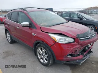 2014 Ford Escape SE with VIN 1FMCU9G90EUD89356, listed as a IAAI auction lot 41841229 with 148,997 mi miles and . Bid and sale history available at carsss.com. Image 1.