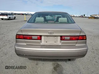 1999 Toyota Camry LE с VIN 4T1BG22K3XU536230, выставлен на аукционе Copart как лот 58992755 с пробегом Не указан миль и Списание • Salvage title. История ставок и продаж доступна на DreamBid. Изображение 6.