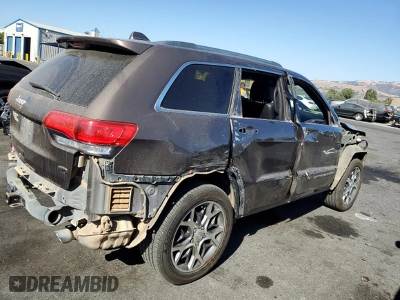 2019 Jeep Grand Cherokee Overland with VIN 1C4RJFCT7KC833390, listed as a Copart auction lot 74015774 with 64,598 mi miles and Salvage Title. Bid and sale history available at carsss.com. Image 3.