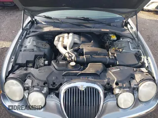 2003 Jaguar S-Type with VIN SAJEA01T23FM93839, listed as a IAAI auction lot 41891973 with 153,761 mi miles and . Bid and sale history available at DreamBid. Image 10.