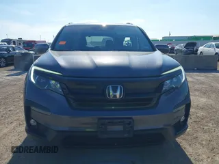 2021 Honda Pilot Special Edition with VIN 5FNYF5H27MB040801, listed as a IAAI auction lot 41656669 with 54,764 mi miles and . Bid and sale history available at DreamBid. Image 12.
