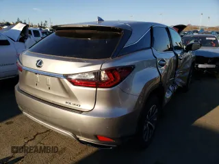 2021 Lexus RX with VIN 2T2AZMDAXMC275791, listed as a Copart auction lot 40304433 with 39,010 mi miles. Bid and sale history available at carsss.com. Image 3.