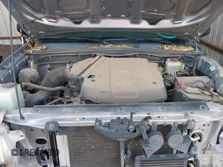 2014 Toyota Tacoma with VIN 3TMLU4EN3EM162738, listed as a IAAI auction lot 41871226 with 135,318 mi miles and . Bid and sale history available at DreamBid. Image 10.