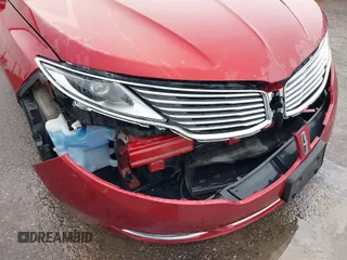 2014 Lincoln MKZ z VIN 3LN6L2J9XER806263, wystawiony jako IAAI lot #41794501 z przebiegiem 96 845 mil mil oraz . Historia ofert i sprzedaży dostępna na DreamBid. Obrazek 6.