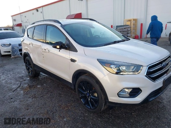 2017 Ford Escape Titanium with VIN 1FMCU9J93HUE96611, listed as a IAAI auction lot 41546906 with 90,586 mi miles. Bid and sale history available at carsss.com. Image 1.