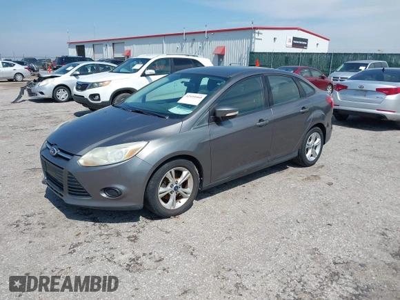 2013 Ford Focus SE with VIN 1FADP3F25DL337961, listed as a IAAI auction lot 42410460 with 143,446 mi miles and . Bid and sale history available at DreamBid. Image 2.