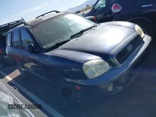 2005 Hyundai Santa Fe GLS with VIN KM8SC73D15U974220, listed as a IAAI auction lot 41514751 with 241,080 mi miles and . Bid and sale history available at DreamBid. Image 1.