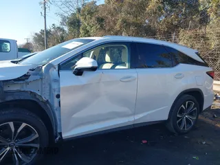 2019 Lexus RX 350L Premium with VIN JTJDZKCA0K2019725, listed as a IAAI auction lot 41303759 with 89,848 mi miles and . Bid and sale history available at DreamBid. Image 14.