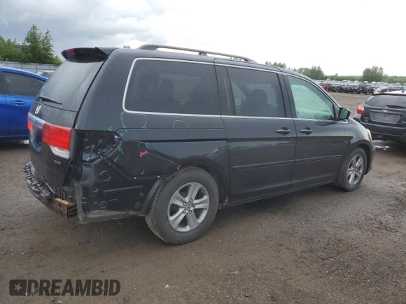 2009 Honda Odyssey Touring with VIN 5FNRL38809B503357, listed as a Copart auction lot 58035914 with 191,671 mi miles and Salvage Title. Bid and sale history available at carsss.com. Image 3.