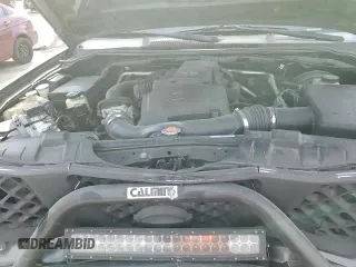 2007 Nissan Frontier SE z VIN 1N6AD07W57C463535, wystawiony jako Copart lot #84911344 z przebiegiem 173 896 mil mil oraz Szkoda całkowita • Salvage title. Historia ofert i sprzedaży dostępna na DreamBid. Obrazek 15.