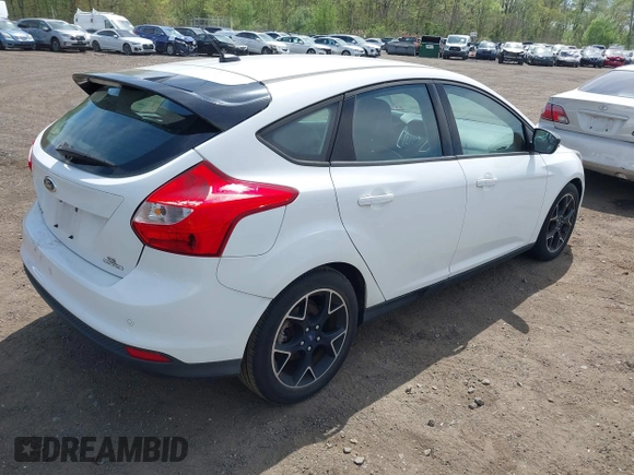 2013 Ford Focus SE with VIN 1FADP3K29DL182434, listed as a IAAI auction lot 42138008 with 103,072 mi miles. Bid and sale history available at carsss.com. Image 4.