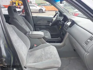 2004 Honda Pilot EX with VIN 2HKYF18444H583826, listed as a IAAI auction lot 41812601 with 196,846 mi miles. Bid and sale history available at carsss.com. Image 5.