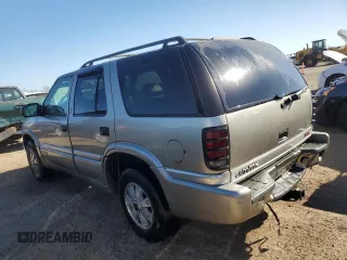 1999 GMC Jimmy SLE with VIN 1GKDT13W1X2537011, listed as a Copart auction lot 76623754 with 212,083 mi miles and Salvage Title. Bid and sale history available at carsss.com. Image 2.