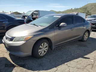 2012 Honda Civic Sdn LX with VIN 19XFB2F50CE304007, listed as a Copart auction lot 49534745 with 329,732 mi miles and Clean Title. Bid and sale history available at carsss.com. Image 1.