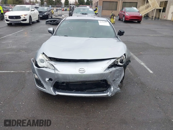 2016 Scion FR-S with VIN JF1ZNAA1XG8709798, listed as a IAAI auction lot 41713314 with 139,450 mi miles. Bid and sale history available at carsss.com. Image 6.