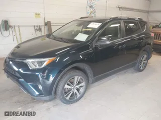 2017 Toyota RAV4 XLE with VIN JTMRFREV6HD208421, listed as a IAAI auction lot 42078130 with 228,365 mi miles. Bid and sale history available at carsss.com. Image 2.