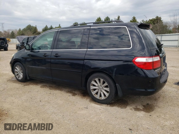 2007 Honda Odyssey Touring with VIN 5FNRL38847B022928, listed as a Copart auction lot 53869135 with 217,620 mi miles and Salvage Title. Bid and sale history available at DreamBid. Image 2.