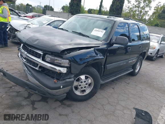 2005 Chevrolet Tahoe Z71 with VIN 1GNEC13TX5R145310, listed as a IAAI auction lot 42056793 with 159,002 mi miles and . Bid and sale history available at DreamBid. Image 2.