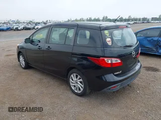 2015 Mazda 5 Sport с VIN JM1CW2BL2F0185045, выставлен на аукционе IAAI как лот 42487509 с пробегом 164 978 миль миль и . История ставок и продаж доступна на DreamBid. Изображение 3.