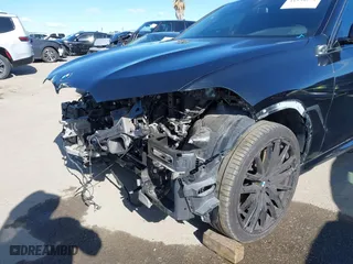 2022 BMW X6 M50i with VIN 5UXCY8C02N9M69883, listed as a IAAI auction lot 41938291 with 37,902 mi miles. Bid and sale history available at carsss.com. Image 6.