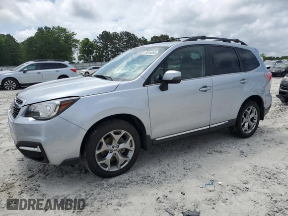 2017 Subaru Forester Touring with VIN JF2SJAWC6HH556728, listed as a Copart auction lot 54914055 with 112,686 mi miles and Salvage title. Bid and sale history available at DreamBid. Image 1.