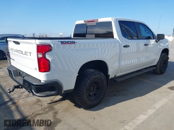 2021 Chevrolet Silverado 1500 LT Trail Boss with VIN 1GCPYFEL3MZ129400, listed as a IAAI auction lot 42024225 with 73,571 mi miles and . Bid and sale history available at DreamBid. Image 4.
