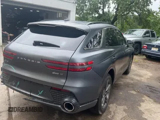 2022 Genesis GV70 Sport with VIN KMUMCDTC6NU028274, listed as a Copart auction lot 61770155 with 46,523 mi miles and Salvage title. Bid and sale history available at DreamBid. Image 4.