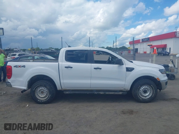 2020 Ford Ranger XL z VIN 1FTER4FH6LLA28453, wystawiony jako IAAI lot #42209983 z przebiegiem 139 613 mil mil oraz . Historia ofert i sprzedaży dostępna na DreamBid. Obrazek 13.