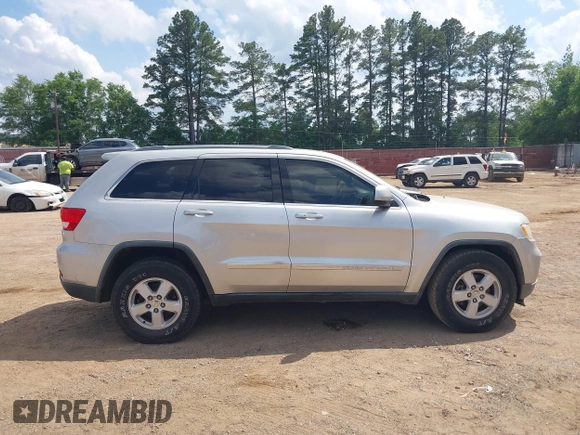 2012 Jeep Grand Cherokee Laredo with VIN 1C4RJEAG4CC251359, listed as a IAAI auction lot 41986762 with 172,331 mi miles. Bid and sale history available at carsss.com. Image 13.