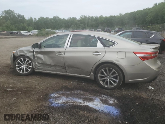 2014 Toyota Avalon Limited z VIN 4T1BK1EB7EU079438, wystawiony jako Copart lot #56710265 z przebiegiem 132 762 mil mil oraz Szkoda całkowita • Salvage title. Historia ofert i sprzedaży dostępna na DreamBid. Obrazek 2.