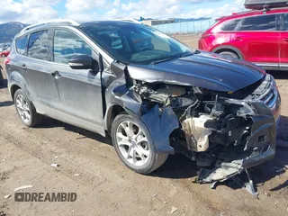 2016 Ford Escape Titanium with VIN 1FMCU9J96GUB96009, listed as a IAAI auction lot 41866127 with 132,990 mi miles and . Bid and sale history available at DreamBid. Image 1.