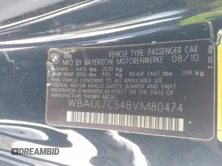 2011 BMW 1 Series 128i with VIN WBAUL7C54BVM80474, listed as a IAAI auction lot 42031032 with 76,617 mi miles and . Bid and sale history available at carsss.com. Image 9.