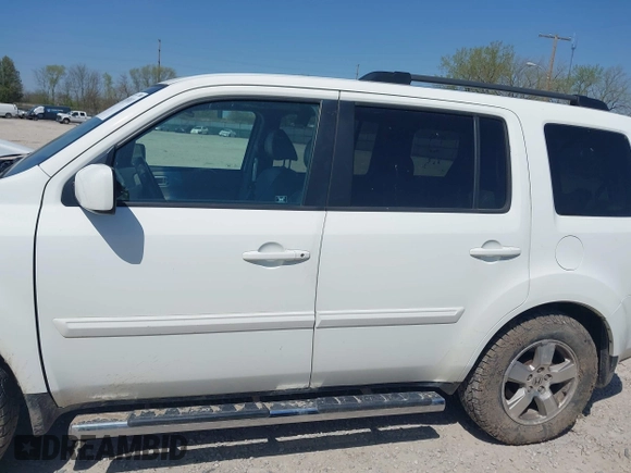 2011 Honda Pilot EX-L with VIN 5FNYF4H69BB091503, listed as a IAAI auction lot 42103011 with 246,816 mi miles and . Bid and sale history available at carsss.com. Image 14.
