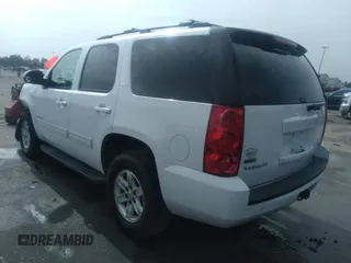 2009 GMC Yukon SLT w/4SB with VIN 1GKFC33049R272997, listed as a IAAI auction lot 39935360 with 290,952 mi miles. Bid and sale history available at carsss.com. Image 3.