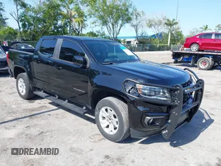 2021 Chevrolet Colorado 2WD LT z VIN 1GCGSCEN1M1131727, wystawiony jako IAAI lot #42181484 z przebiegiem 54 764 mil mil oraz . Historia ofert i sprzedaży dostępna na DreamBid. Obrazek 1.
