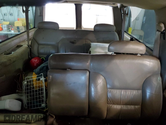 1999 Chevrolet Suburban with VIN 1GNGK26J6XJ444189, listed as a Copart auction lot 68249474 with 216,412 mi miles and Salvage Title. Bid and sale history available at carsss.com. Image 10.