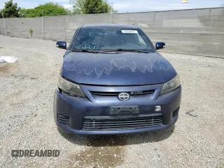 2013 Scion tC z VIN JTKJF5C76D3063027, wystawiony jako Copart lot #56604955 z przebiegiem 109 813 mil mil oraz Szkoda całkowita • Salvage title. Historia ofert i sprzedaży dostępna na DreamBid. Obrazek 5.