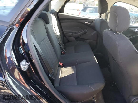 2018 Ford Focus SE with VIN 1FADP3FE9JL306394, listed as a Copart auction lot 52902175 with 77,338 mi miles and Salvage title. Bid and sale history available at DreamBid. Image 10.