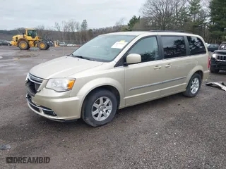 2011 Chrysler Town & Country Touring with VIN 2A4RR5DG5BR798869, listed as a IAAI auction lot 41797153 with 170,384 mi miles. Bid and sale history available at carsss.com. Image 19.