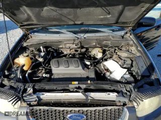 2004 Ford Escape XLT with VIN 1FMYU031X4KB40235, listed as a Copart auction lot 88357735 with 186,797 mi miles and Salvage Title. Bid and sale history available at carsss.com. Image 12.