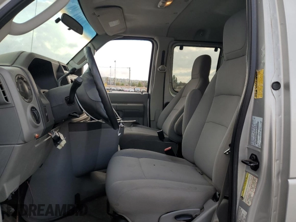 2009 Ford Econoline Passenger XL with VIN 1FBNE31L39DA86660, listed as a Copart auction lot 43724115 with 562,883 mi miles and Salvage title. Bid and sale history available at DreamBid. Image 7.