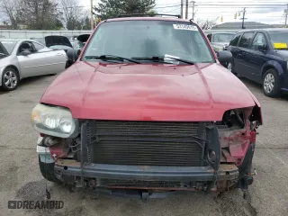 2005 Ford Escape XLT with VIN 1FMYU93105KD73059, listed as a Copart auction lot 53149615 with 143,739 mi miles and Salvage Title. Bid and sale history available at carsss.com. Image 5.