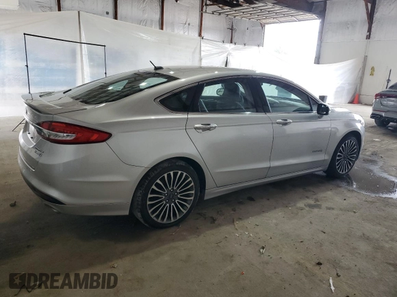2017 Ford Fusion Hybrid Titanium with VIN 3FA6P0RU4HR223512, listed as a Copart auction lot 58739435 with 174,604 mi miles and Clean title. Bid and sale history available at DreamBid. Image 3.